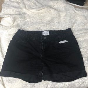Black shorts children place